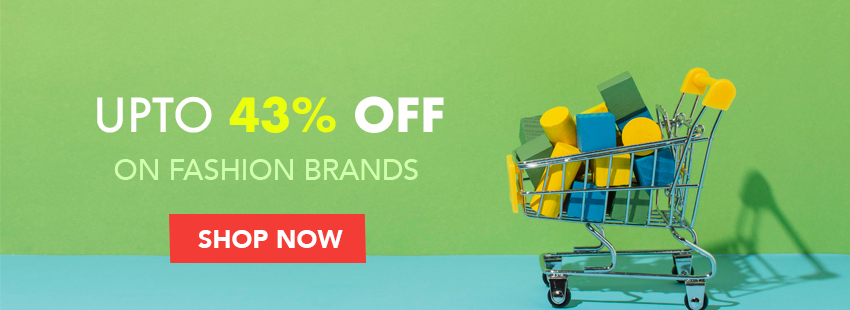 Paper bags of different colors on a blue background, top view, shopping concept, copy space.
